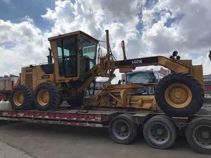 Shipping out Caterpillar Grader & JCB backhoe